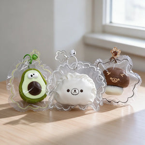 Avocado, mushroom, and dumpling-shaped squishy charms displayed together.
