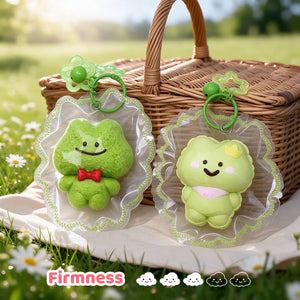 Green frog-shaped squishy bag charm displayed as an accessory.