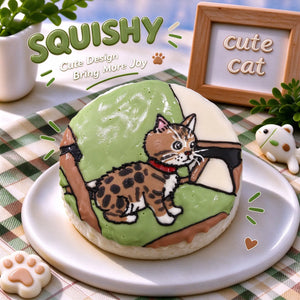 Hand-painted Bengal squishy toy, cute Bengal cat portrait with red collar on soft round fidget toy, green grass outdoor scene glossy surface on display plate