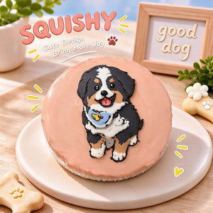 Hand-painted Bernese Mountain Dog squishy toy, cute Berner dog portrait on soft round fidget toy, peach glossy surface with black white tan markings and blue bandana design