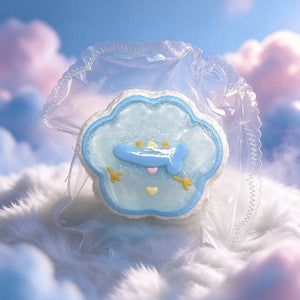 Blue frosted snowman squishy presented against a soft cloud background.