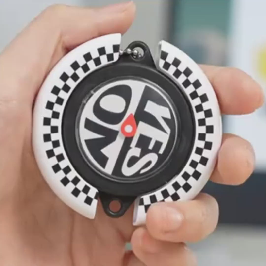 SpinCall gift demonstration video, showing the black and white checkerboard decision spinner keychain's rotating function, displaying the YES NO fidget toy spinning effect and portable carrying usage